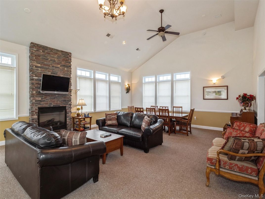Dining room, Fireplace, Interior, Living room, Recessed Lighting, Stone Walls