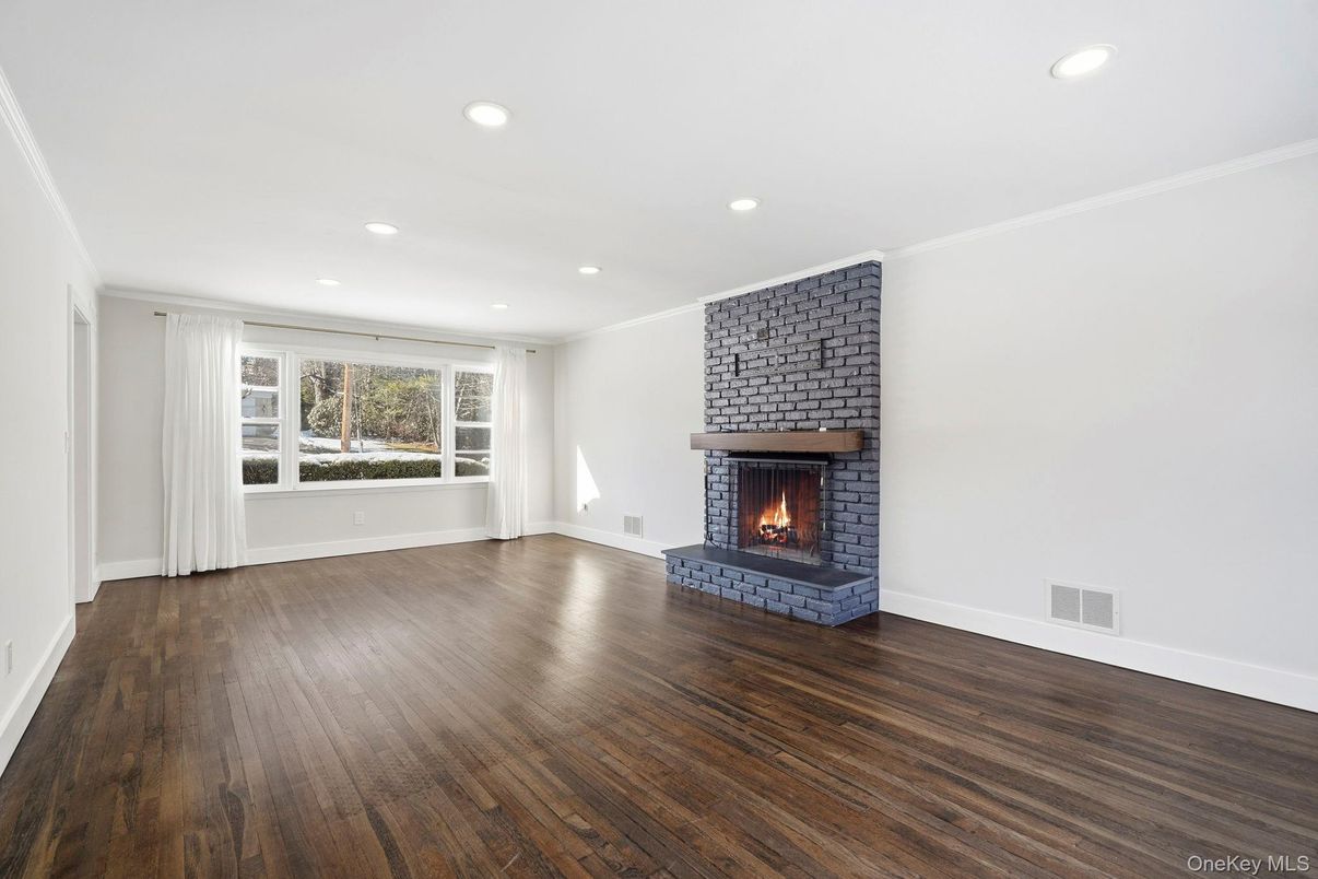 Empty room, Fireplace, Interior, Recessed Lighting, Wood Texture Flooring