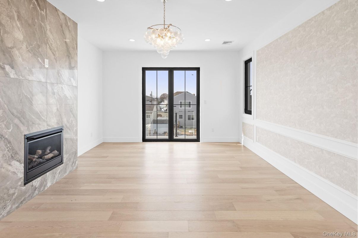 Chandelier, Empty room, Fireplace, Interior, Recessed Lighting, Wood Texture Flooring