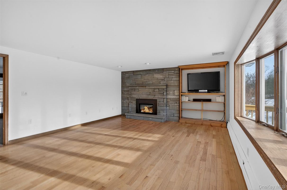 Empty room, Fireplace, Interior, Stone Walls, Wood Texture Flooring
