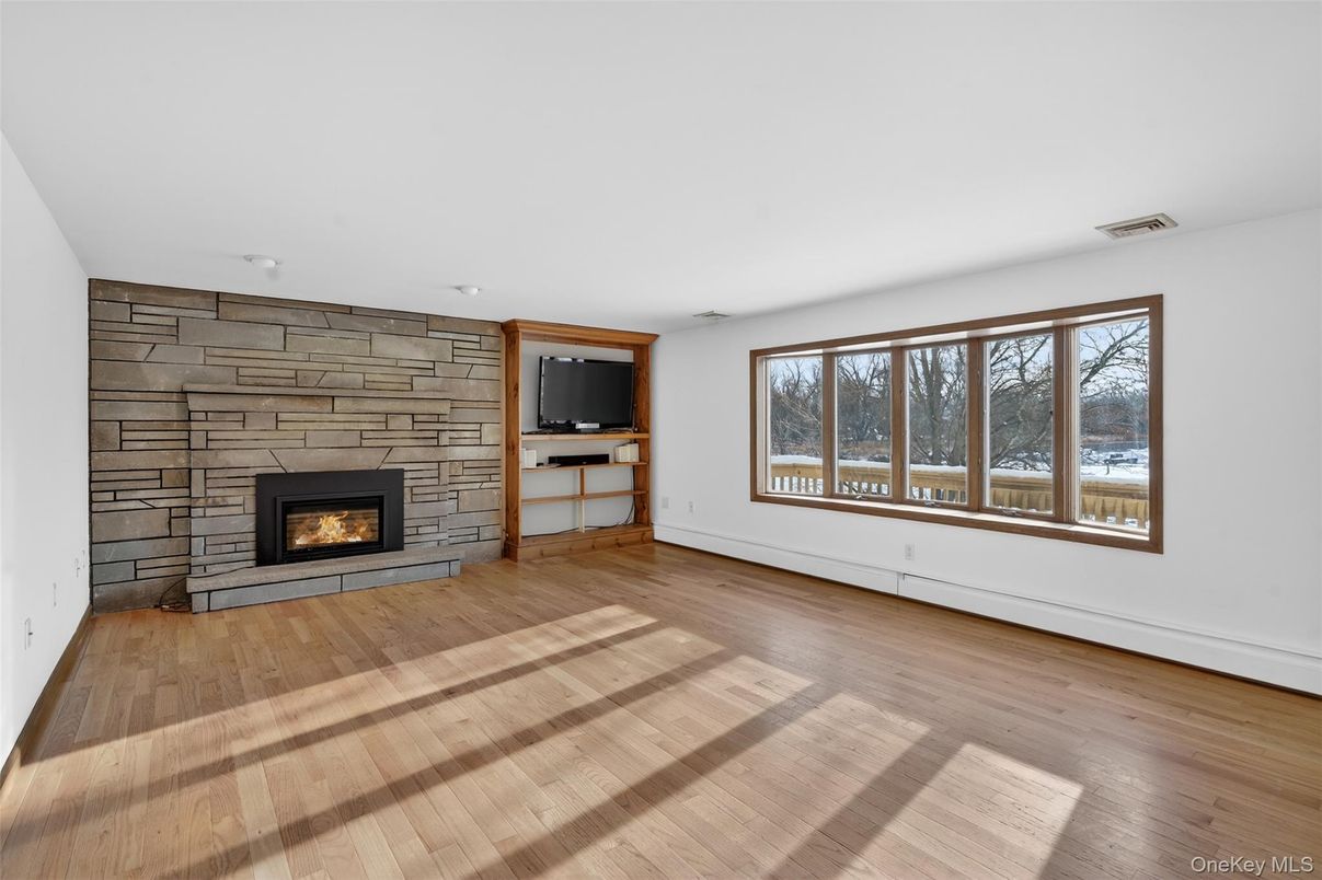 Empty room, Fireplace, Interior, Stone Walls, Wood Texture Flooring