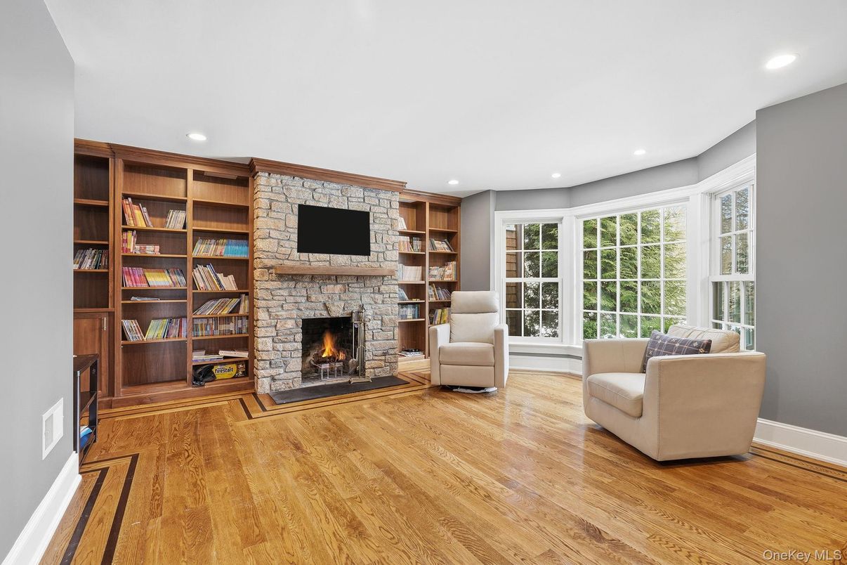 Fireplace, Interior, Living room, Recessed Lighting, Stone Walls, Wood Texture Flooring