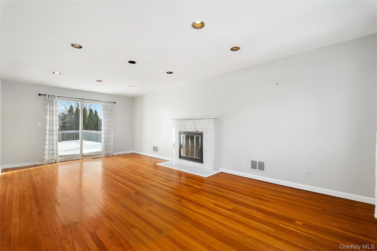 Empty room, Fireplace, Interior, Recessed Lighting, Wood Texture Flooring