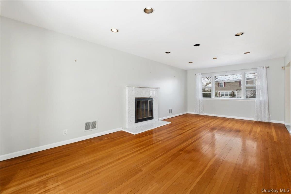 Empty room, Fireplace, Interior, Recessed Lighting, Wood Texture Flooring