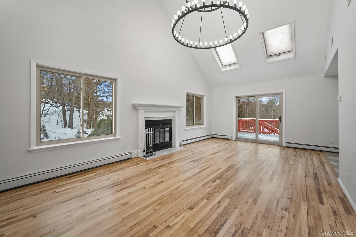 Empty room, Fireplace, Interior, Pendant Lights, Wood Texture Flooring