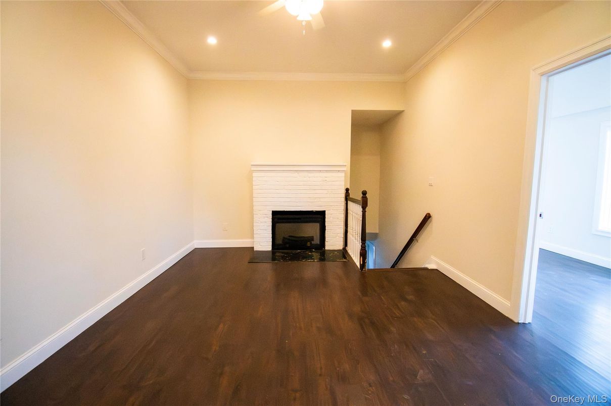 Empty room, Fireplace, Interior, Recessed Lighting, Wood Texture Flooring