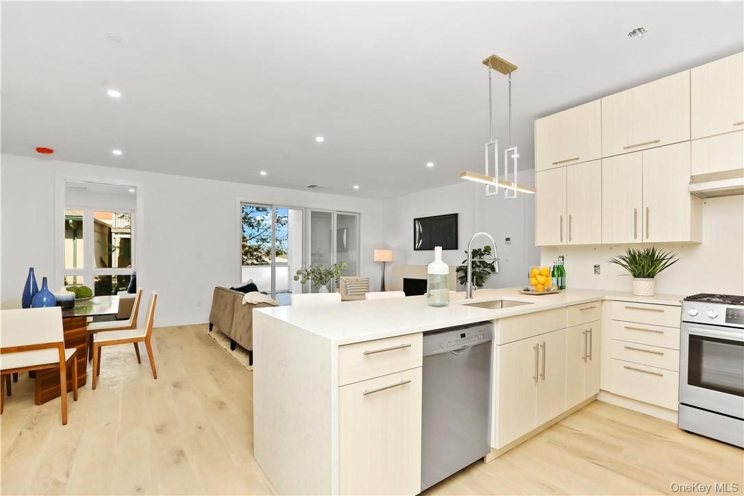 Dining room, Interior, Kitchen, Pendant Lights, Recessed Lighting, Stainless Steel Appliances, Wood Texture Flooring