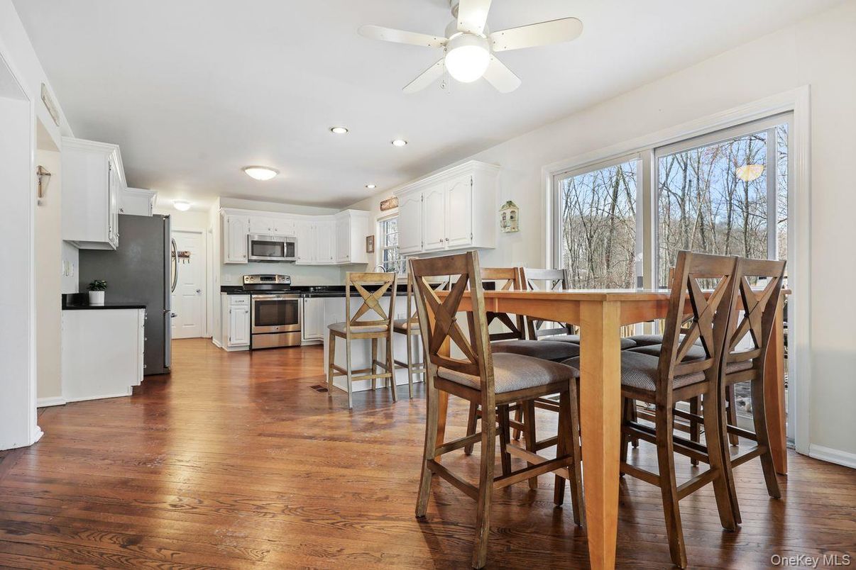 Dining room, Interior, Kitchen, Recessed Lighting, Stainless Steel Appliances, Wood Texture Flooring