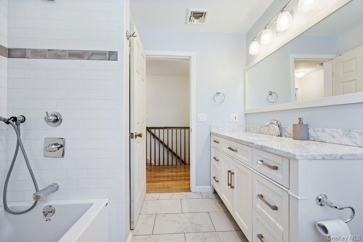 Bathroom, Dual Sink Vanities, Interior, Marble, Wood Texture Flooring