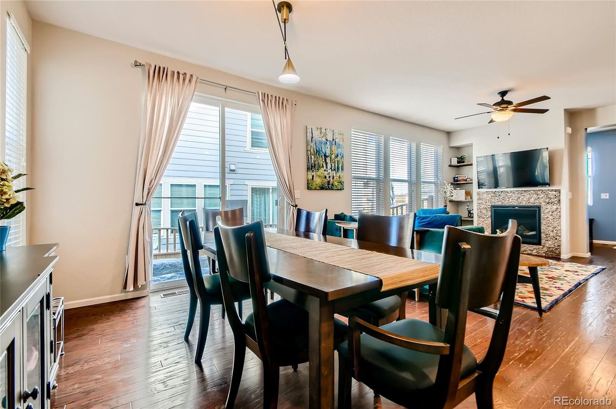 Dining room, Fireplace, Interior, Pendant Lights, Wood Texture Flooring