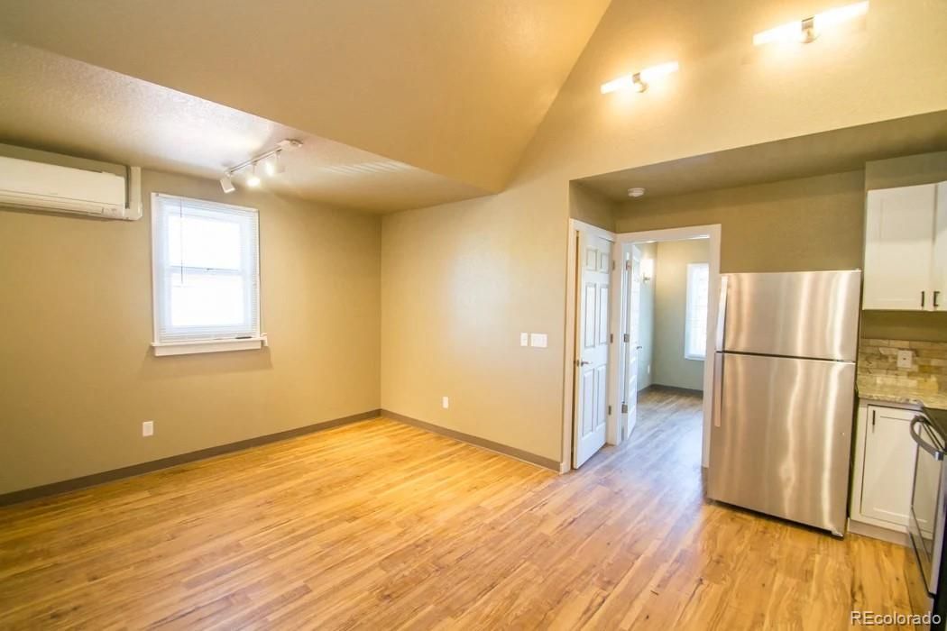 Empty room, Interior, Kitchen, Stainless Steel Appliances, Wood Texture Flooring