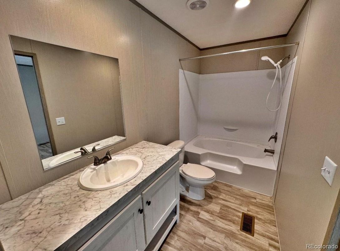 Bathroom, Dual Sink Vanities, Interior, Recessed Lighting, Wood Texture Flooring