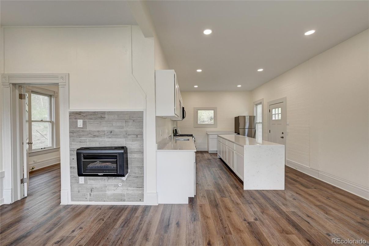 Fireplace, Interior, Kitchen, Recessed Lighting, Wood Texture Flooring