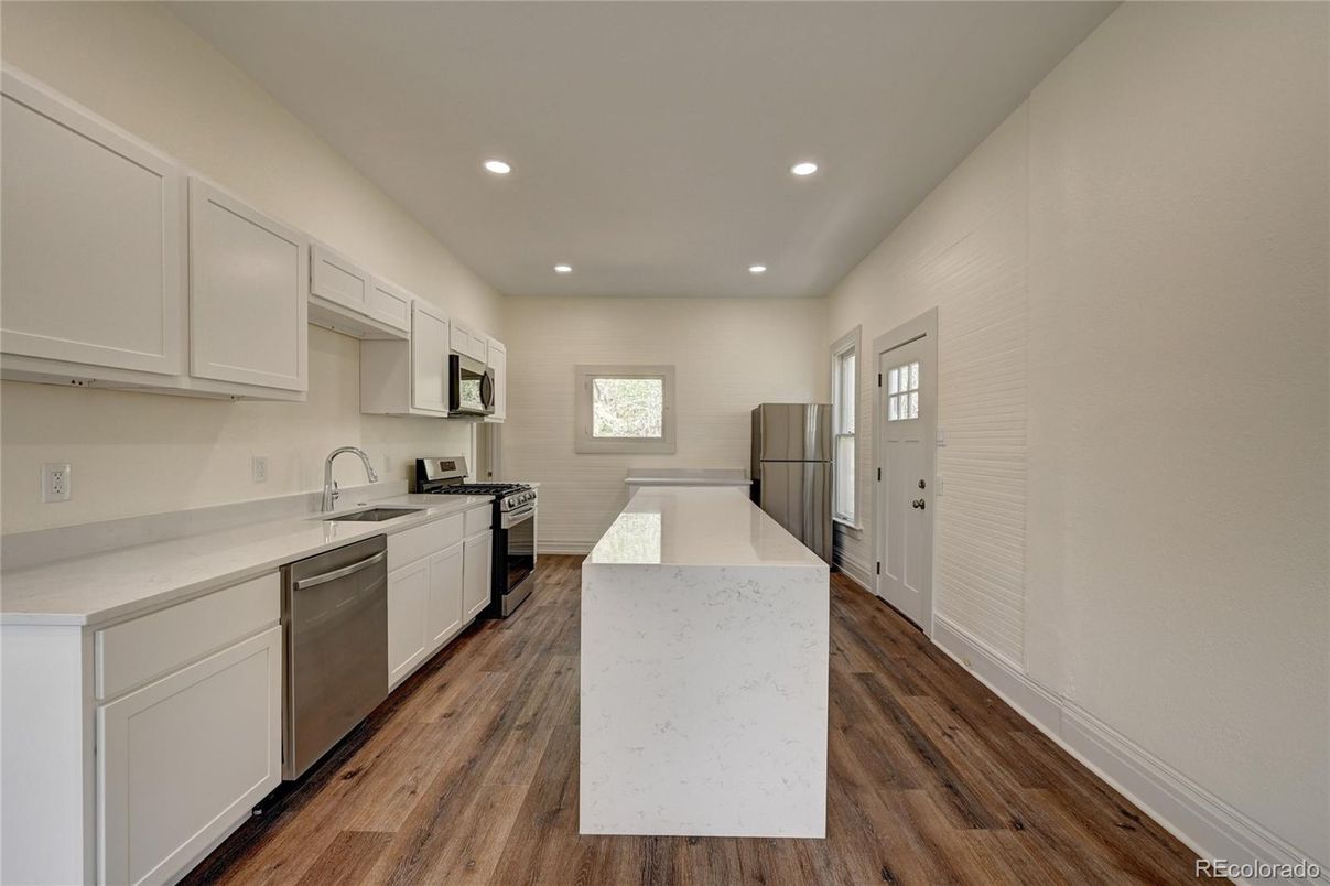 Interior, Kitchen, Recessed Lighting, Stainless Steel Appliances, Wood Texture Flooring