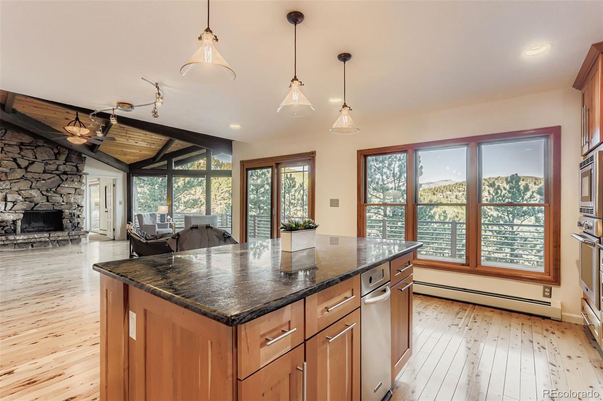 Fireplace, Interior, Kitchen, Pendant Lights, Recessed Lighting, Stone Walls, Wood Texture Flooring