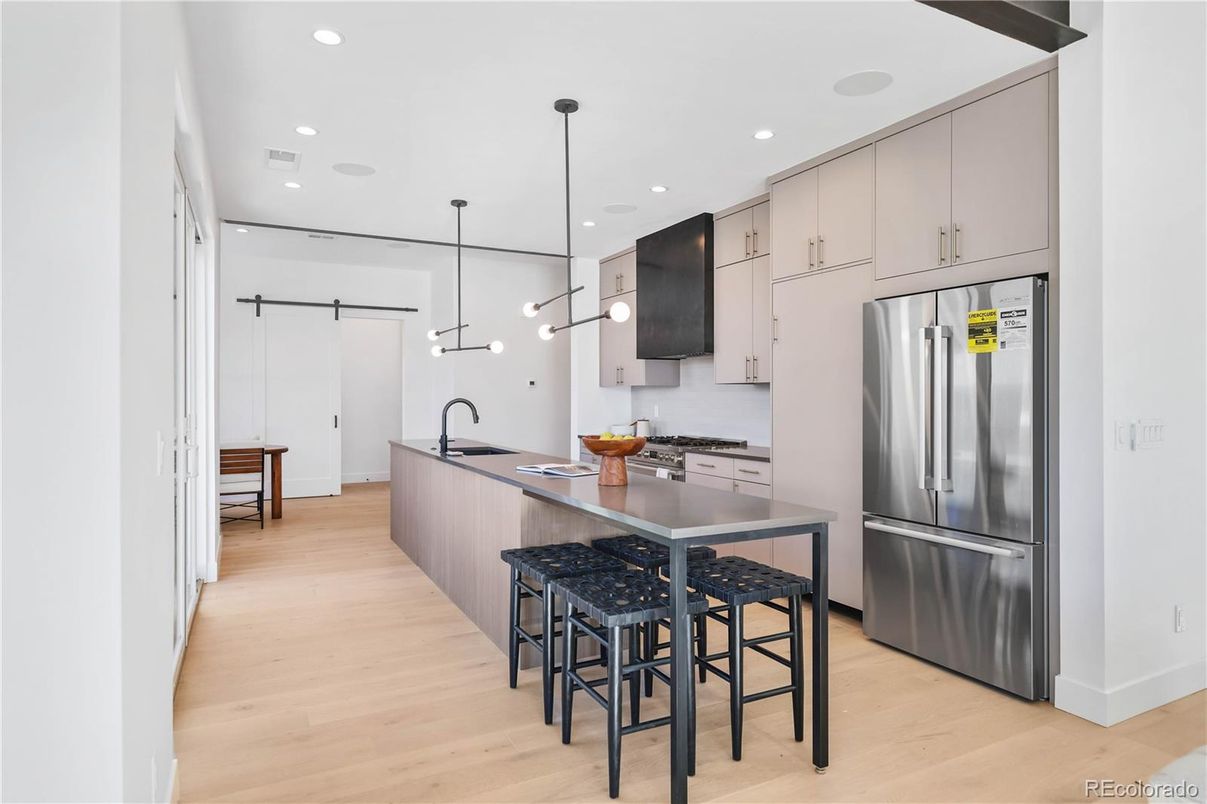 Interior, Kitchen, Pendant Lights, Recessed Lighting, Stainless Steel Appliances, Wood Texture Flooring