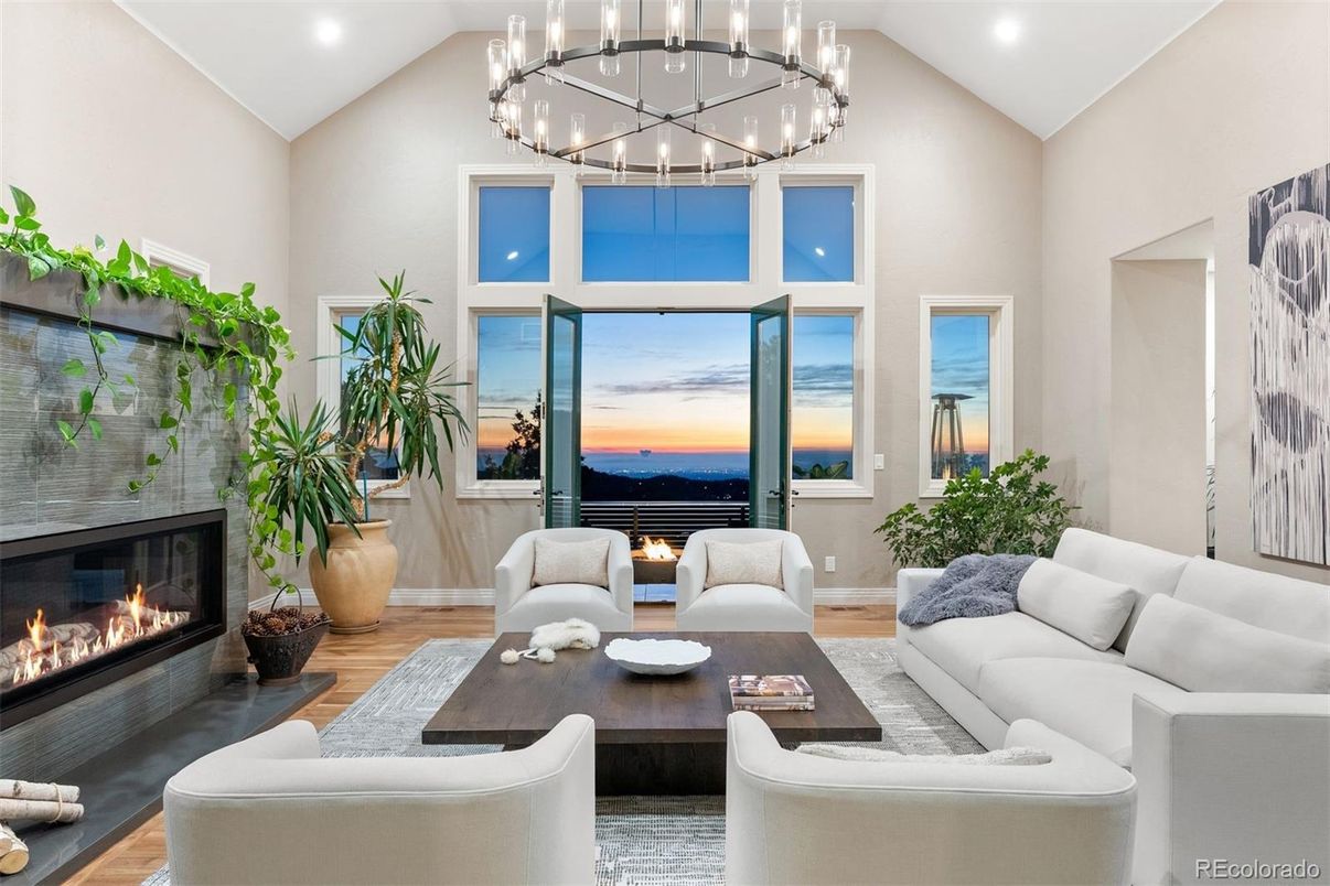 Chandelier, Fireplace, Interior, Living room, Pendant Lights, Recessed Lighting, Water, Wood Texture Flooring