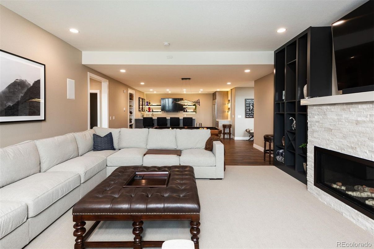 Fireplace, Interior, Kitchen, Living room, Pendant Lights, Recessed Lighting, Stone Walls, Wood Texture Flooring
