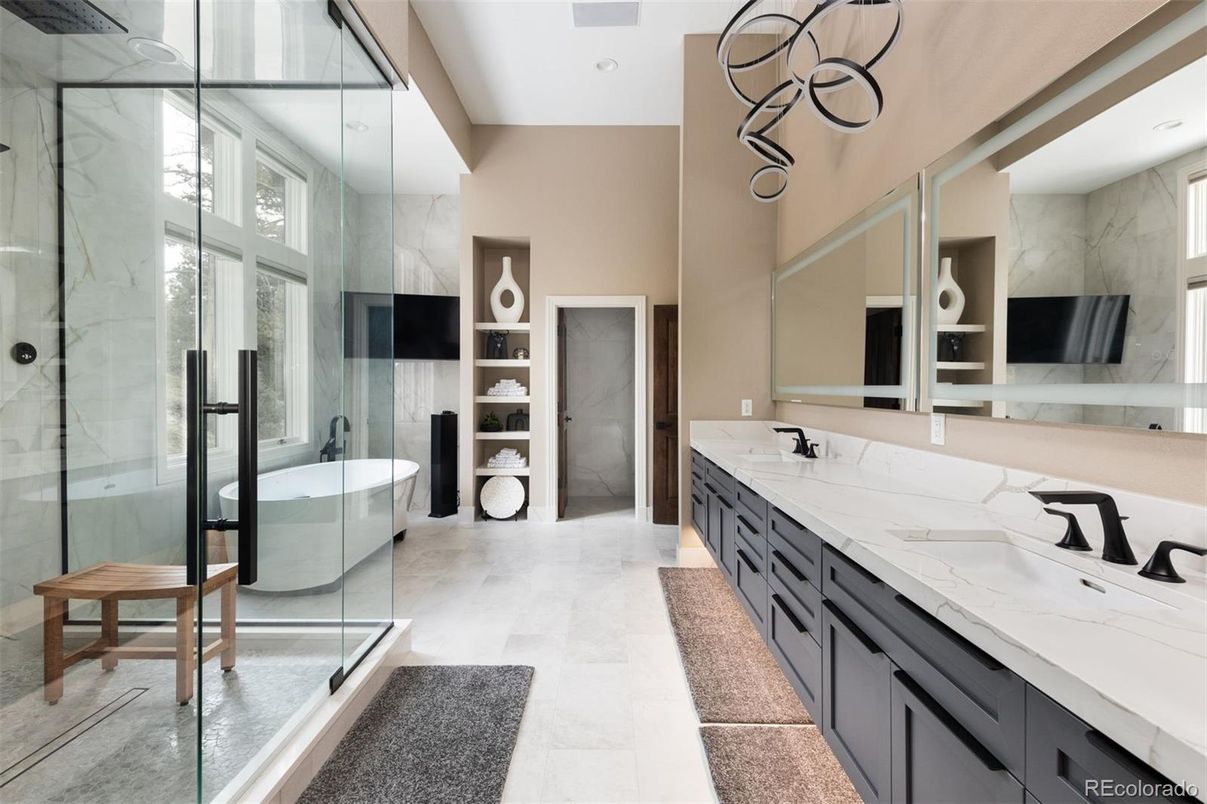Bathroom, Dual Sink Vanities, Free Standing Baths, Glass Shower, Interior, Marble Walls, Pendant Lights, Recessed Lighting