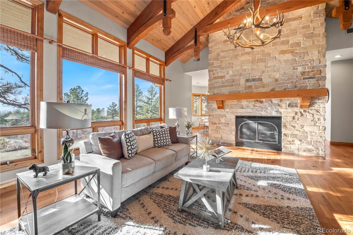 Chandelier, Fireplace, Interior, Living room, Stone Walls, Wooden Beams, Wooden Ceilings, Wood Texture Flooring