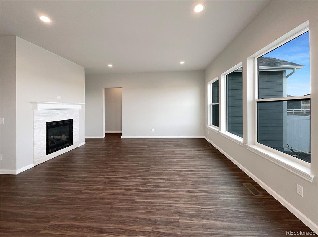 Empty room, Fireplace, Interior, Recessed Lighting, Wood Texture Flooring