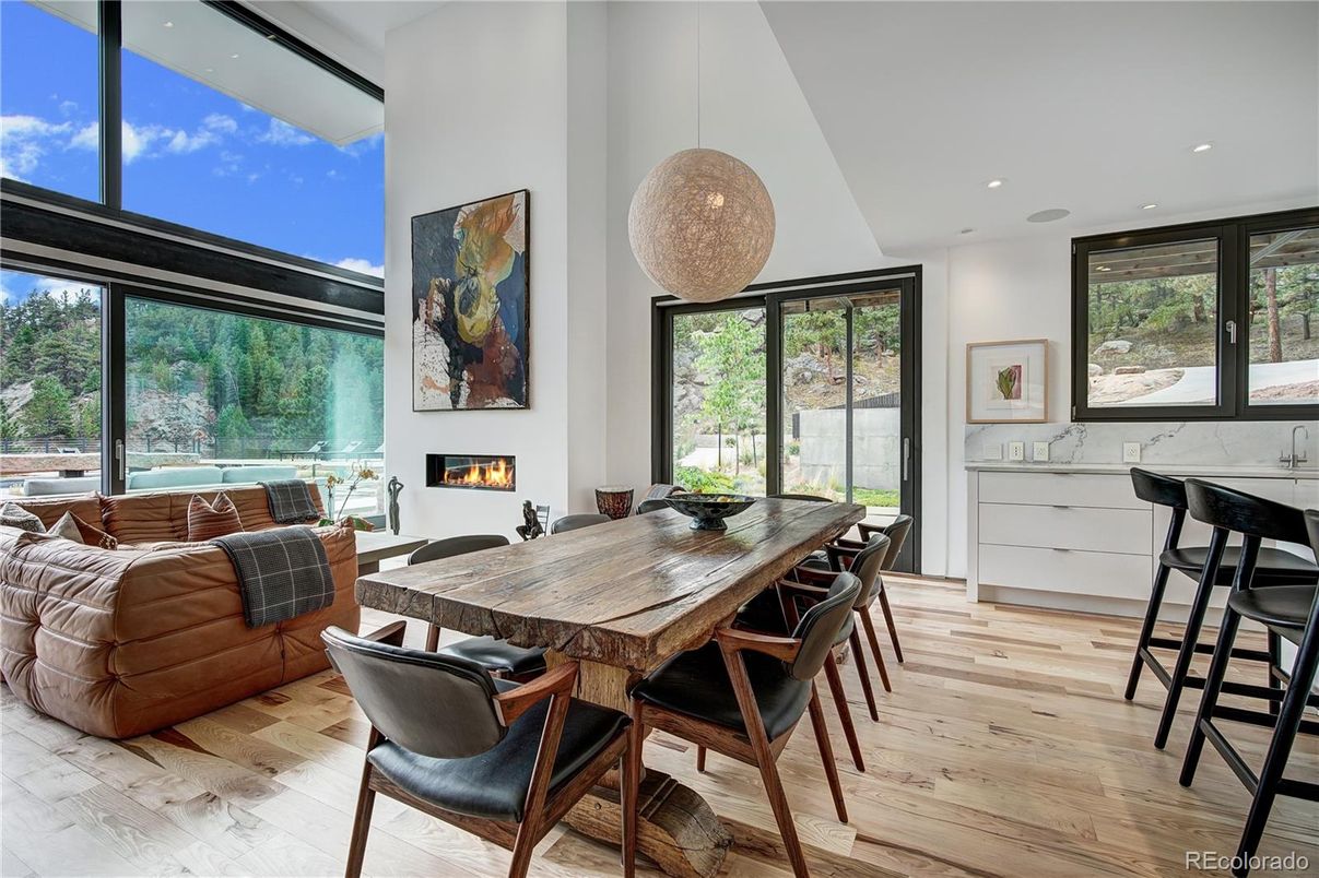 Dining room, Fireplace, Interior, Living room, Pendant Lights, Recessed Lighting, Wood Texture Flooring