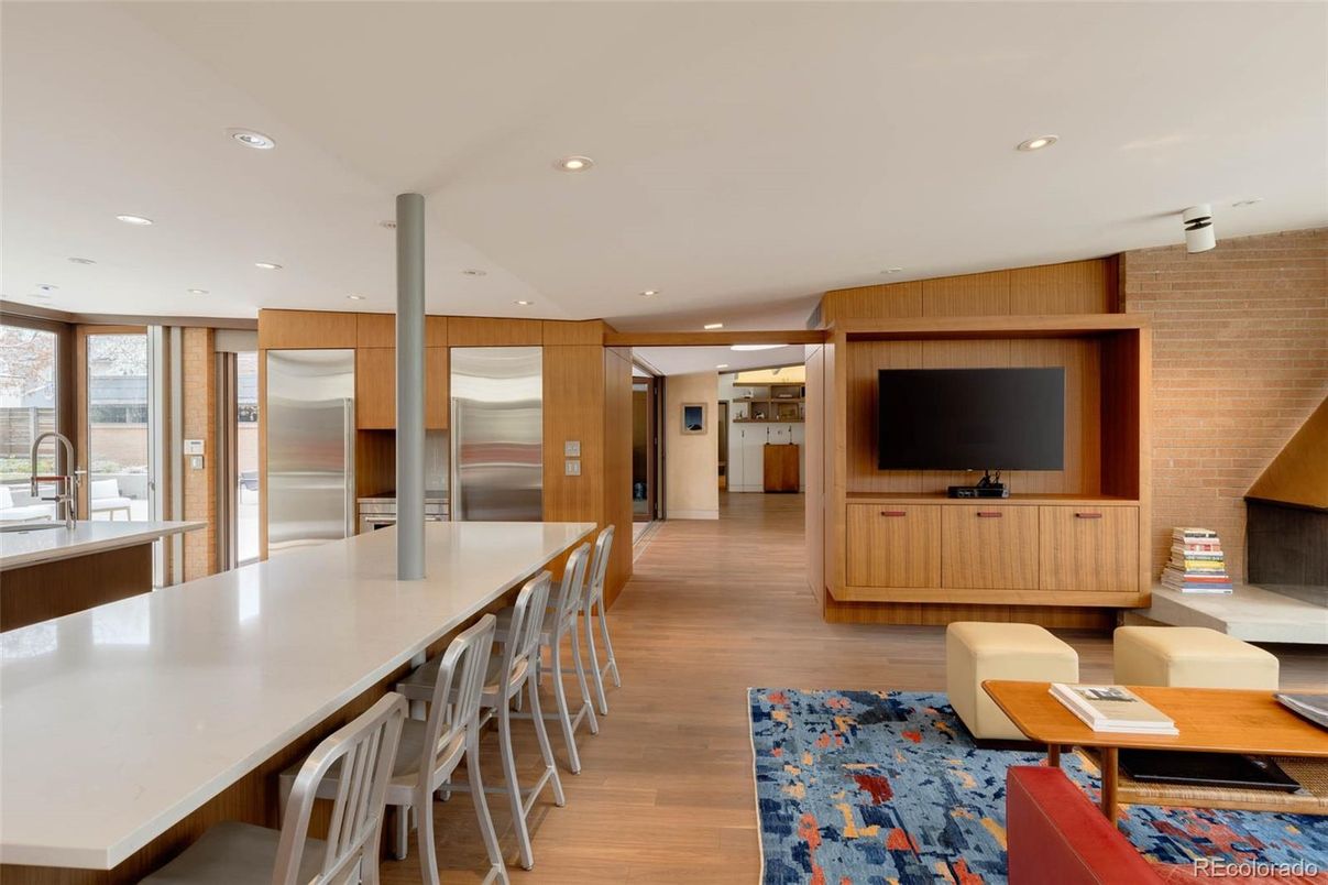 Interior, Kitchen, Living room, Recessed Lighting, Stainless Steel Appliances, Stone Walls, Wood Texture Flooring, Wooden Walls