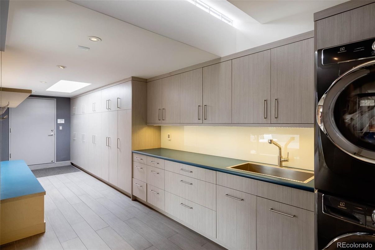 Interior, Kitchen, Recessed Lighting, Washer, Wood Texture Flooring