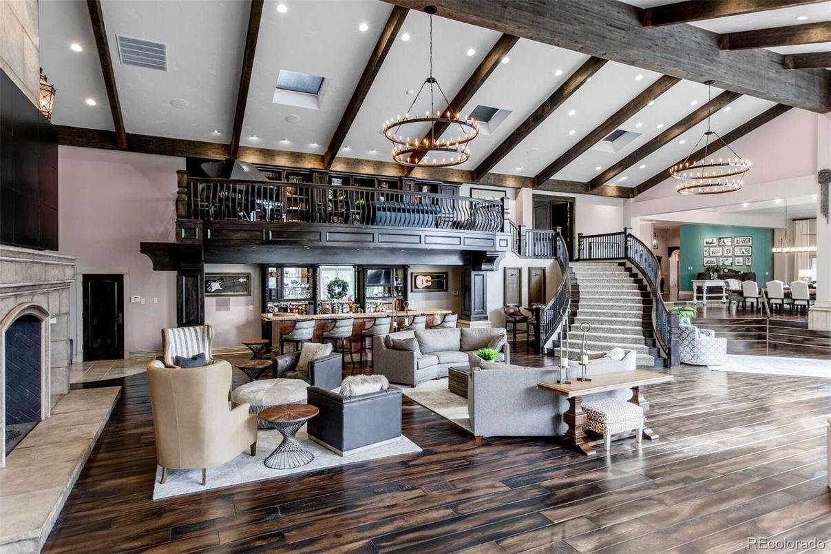 Chandelier, Dining room, Fireplace, Interior, Living room, Pendant Lights, Recessed Lighting, Wooden Beams, Wood Texture Flooring