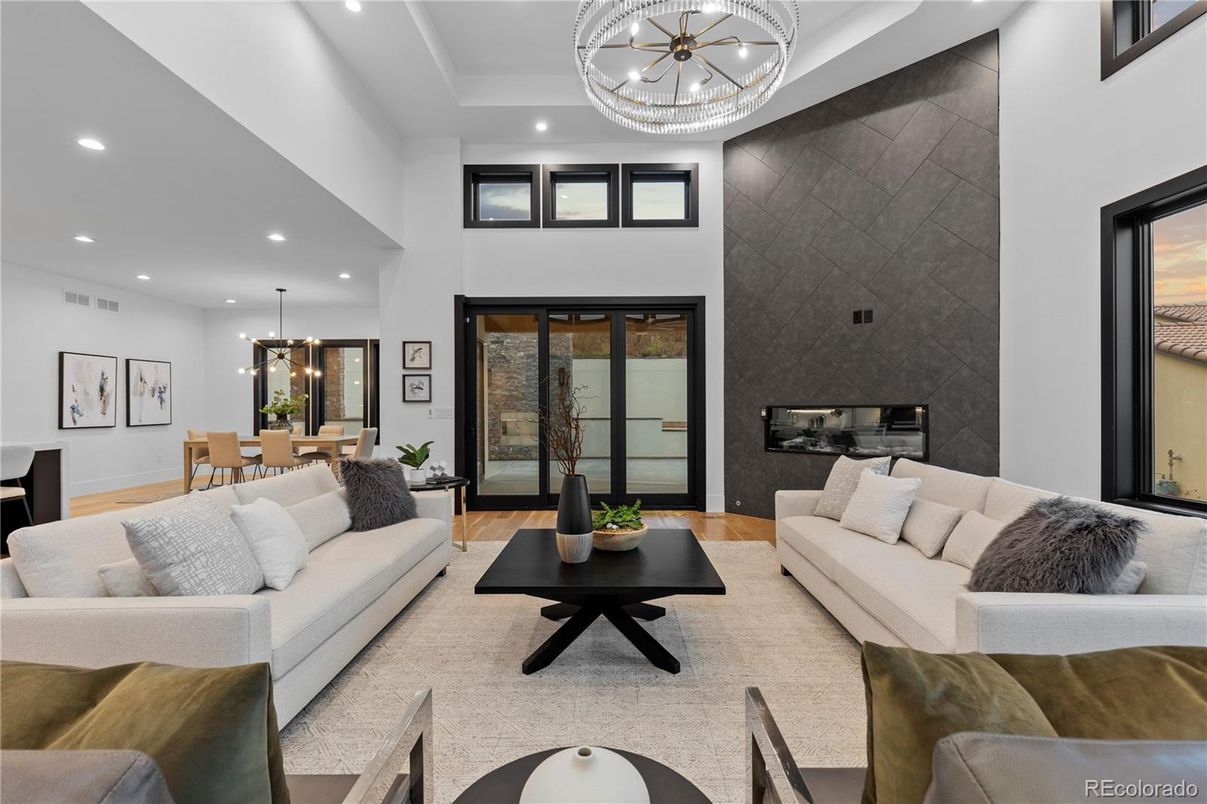 Dining room, Fireplace, Interior, Living room, Pendant Lights, Recessed Lighting, Wood Texture Flooring