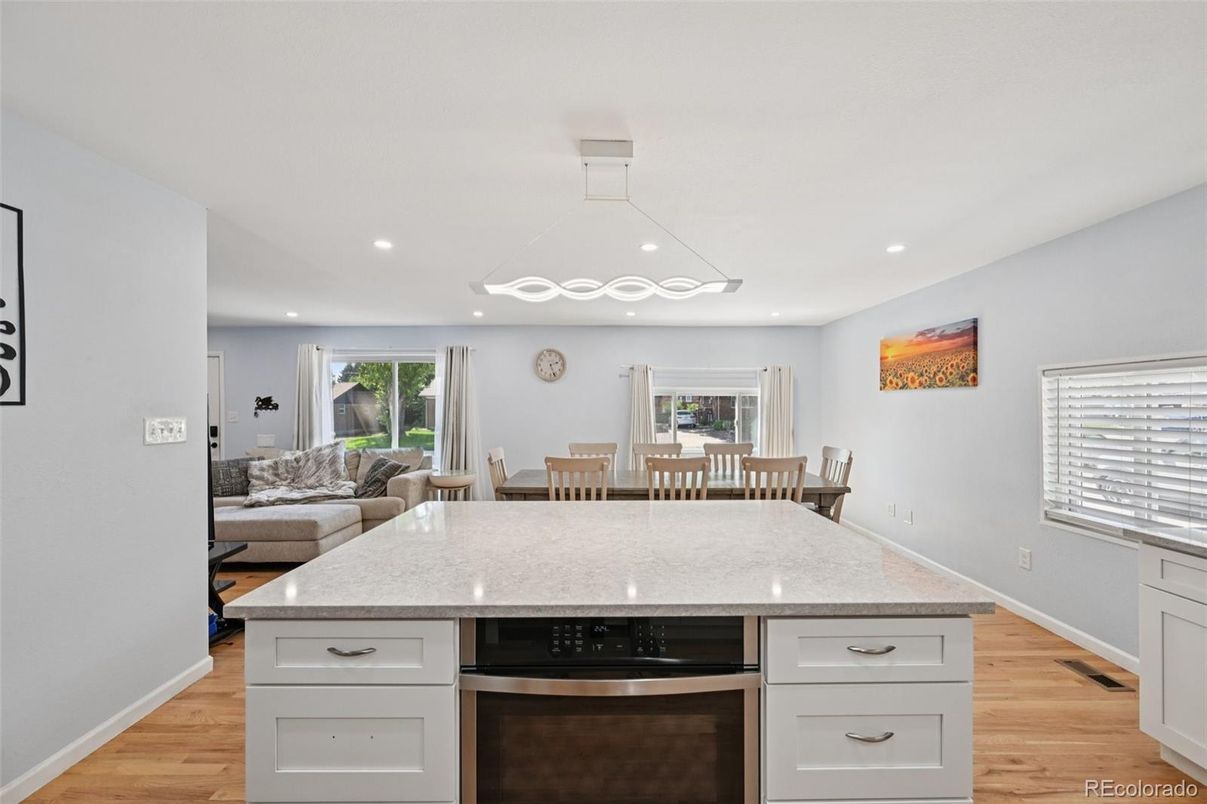 Dining room, Interior, Kitchen, Living room, Pendant Lights, Recessed Lighting, Stainless Steel Appliances, Wood Texture Flooring