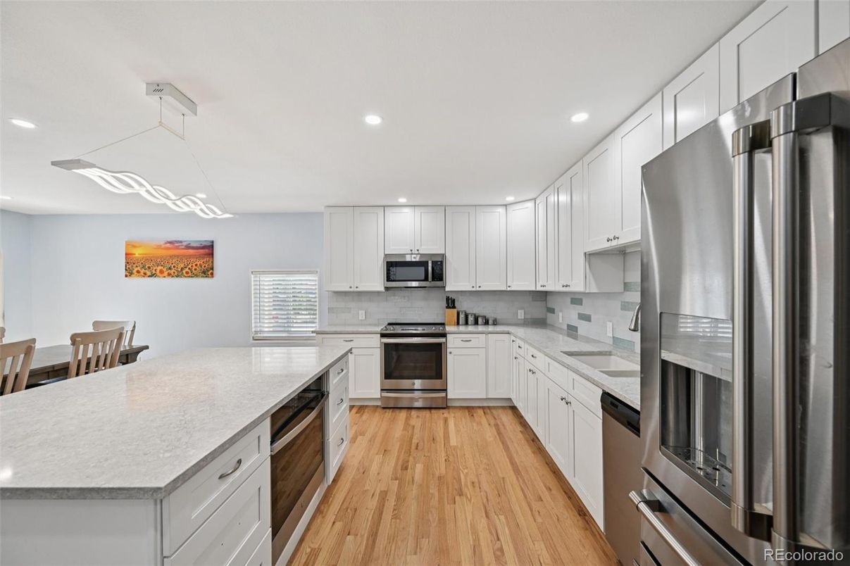 Interior, Kitchen, Pendant Lights, Recessed Lighting, Stainless Steel Appliances, Wood Texture Flooring