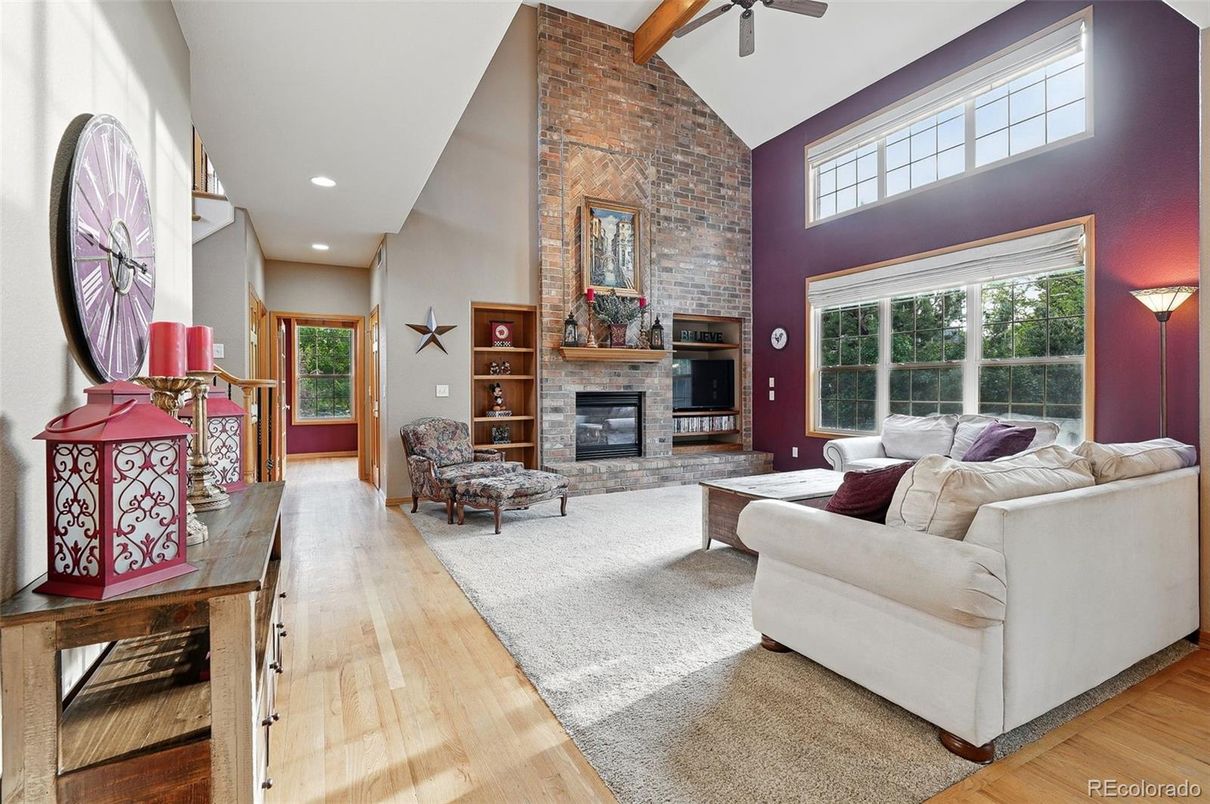 Fireplace, Interior, Living room, Recessed Lighting, Stone Walls, Wood Texture Flooring