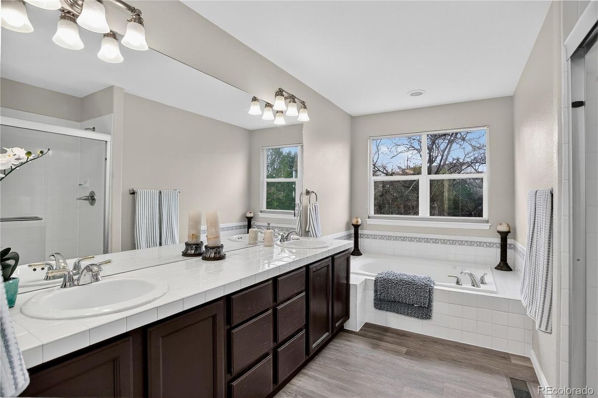 Bathroom, Dual Sink Vanities, Glass Shower, Interior, Tile Countertops, Wood Texture Flooring