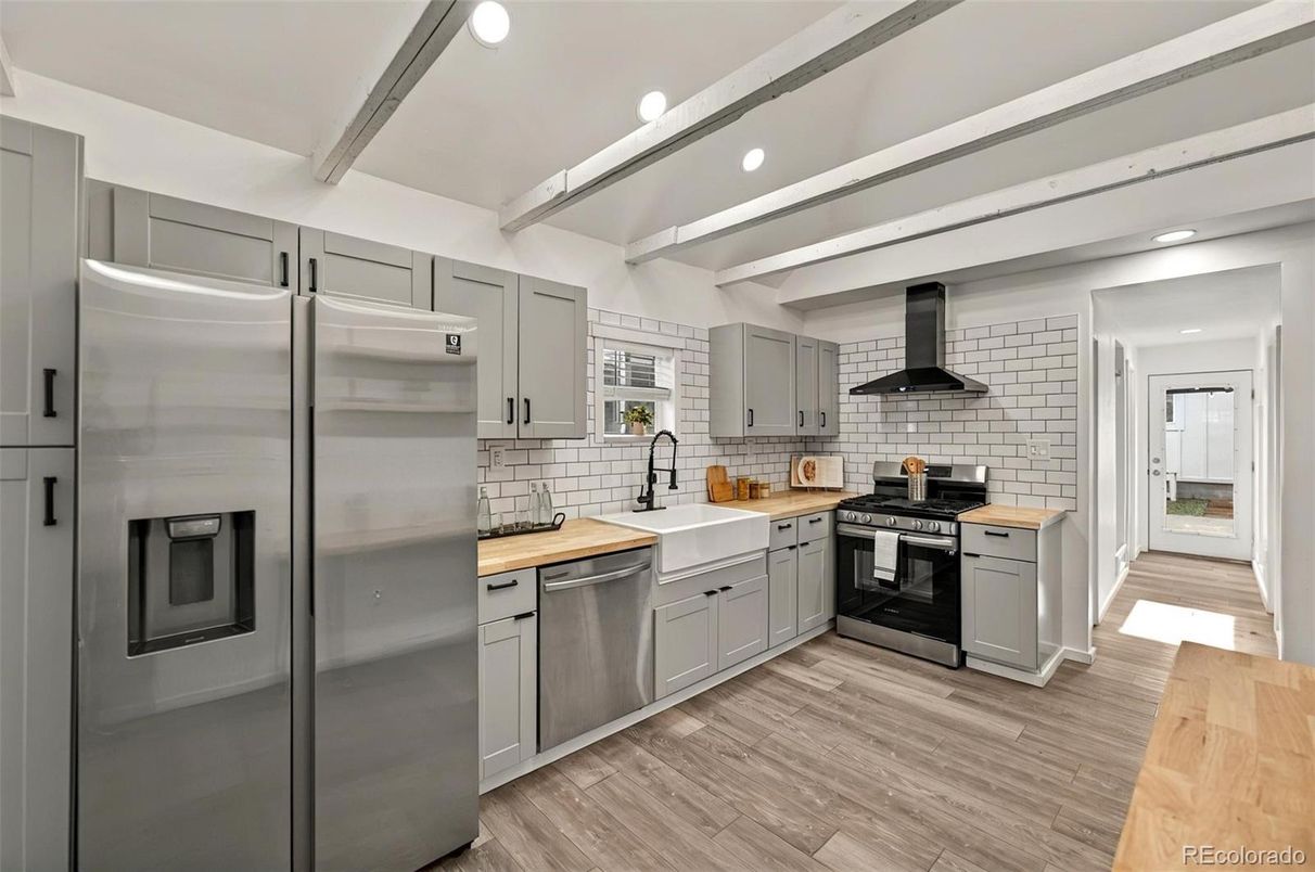 Interior, Kitchen, Recessed Lighting, Stainless Steel Appliances, Stone Walls, Wood Texture Flooring