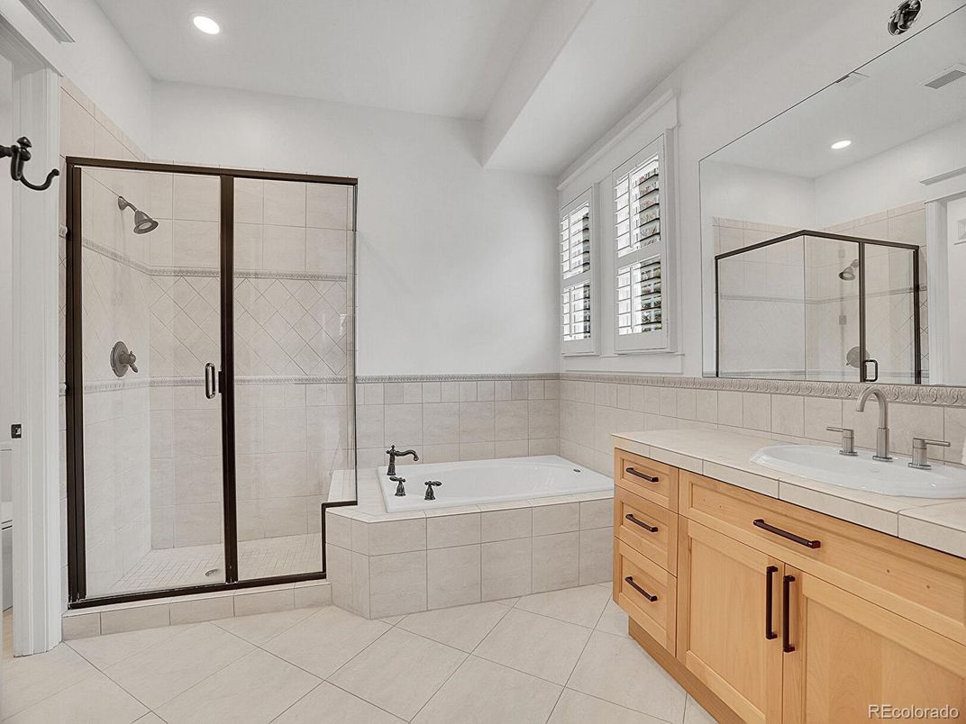Bathroom, Dual Sink Vanities, Glass Shower, Interior, Recessed Lighting, Tile Countertops