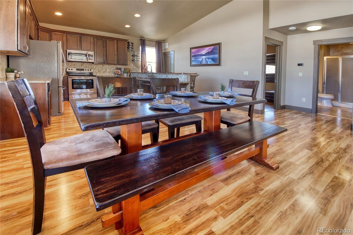 Dining room, Interior, Kitchen, Recessed Lighting, Stainless Steel Appliances, Wood Texture Flooring