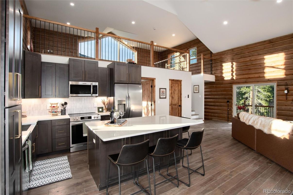 Interior, Kitchen, Recessed Lighting, Stainless Steel Appliances, Wood Texture Flooring, Wooden Walls