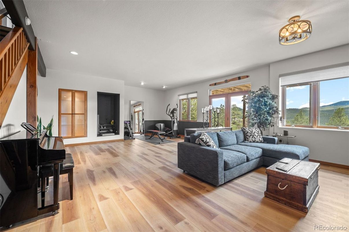 Fitness Equipment, Interior, Living room, Piano, Recessed Lighting, Wood Texture Flooring