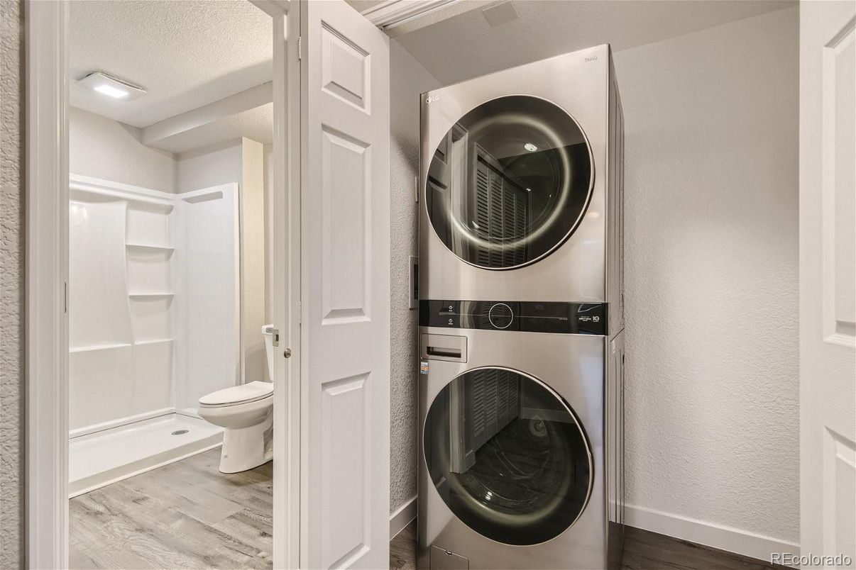 Bathroom, Interior, Recessed Lighting, Utility Closets, Washer, Wood Texture Flooring