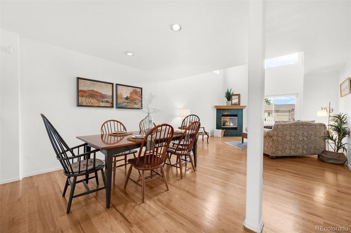 Dining room, Fireplace, Interior, Living room, Recessed Lighting, Wood Texture Flooring