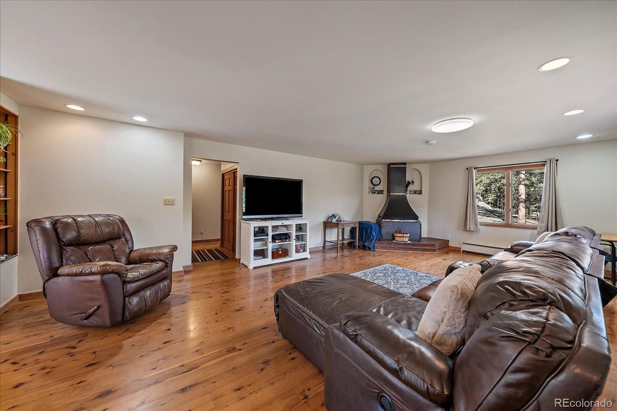 Fireplace, Interior, Living room, Recessed Lighting, Wood Texture Flooring