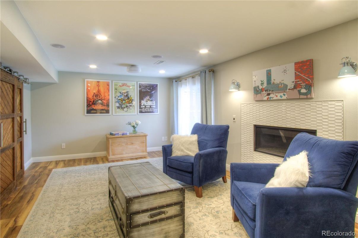 Fireplace, Interior, Living room, Recessed Lighting, Wood Texture Flooring