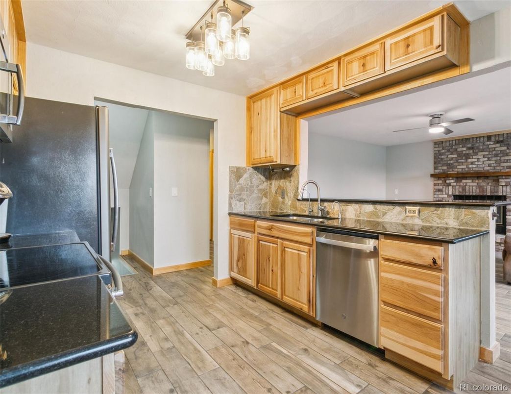 Interior, Kitchen, Stainless Steel Appliances, Stone Walls, Wood Texture Flooring