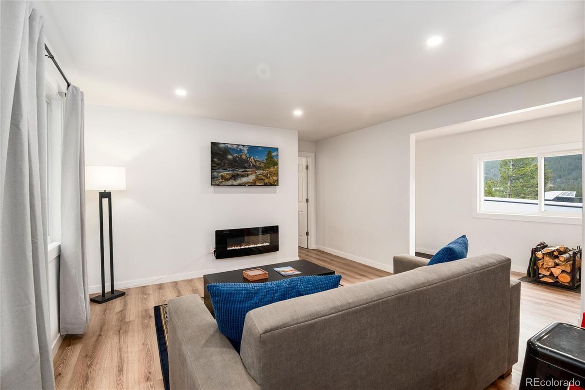 Fireplace, Interior, Living room, Recessed Lighting, Wood Texture Flooring