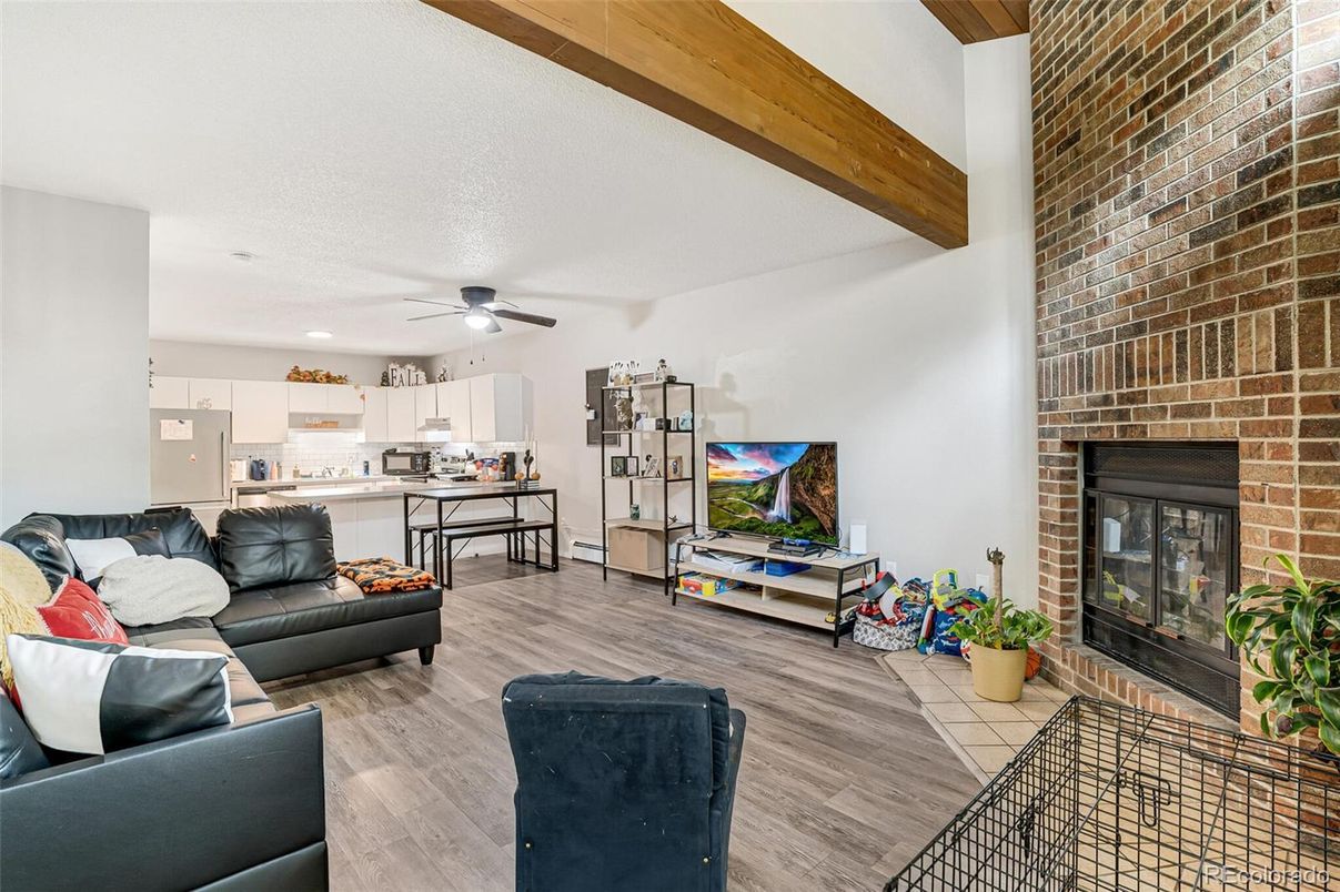 Fireplace, Interior, Kitchen, Living room, Recessed Lighting, Stone Walls, Wooden Beams, Wood Texture Flooring