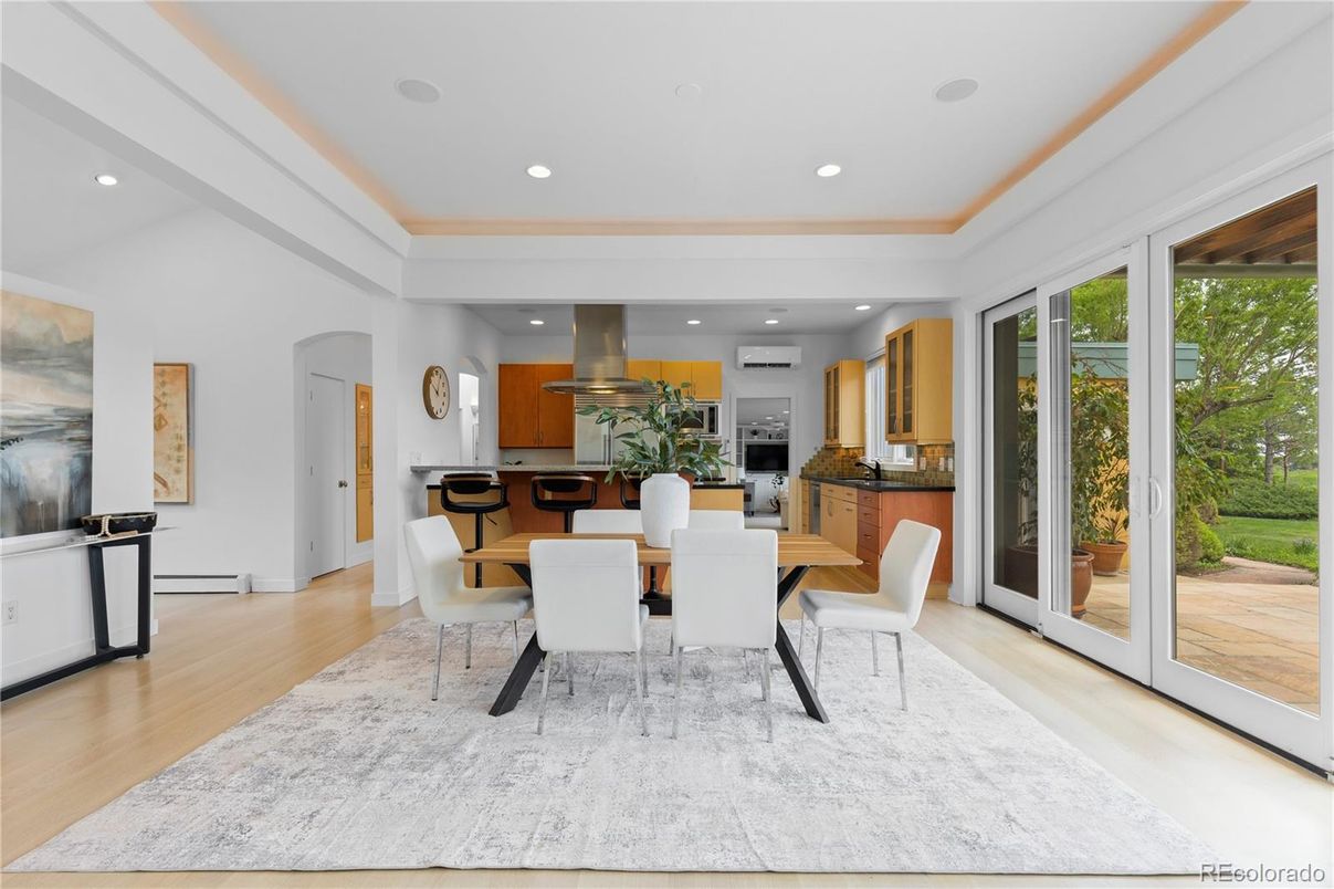 Dining room, Interior, Kitchen, Recessed Lighting, Stainless Steel Appliances, Wood Texture Flooring