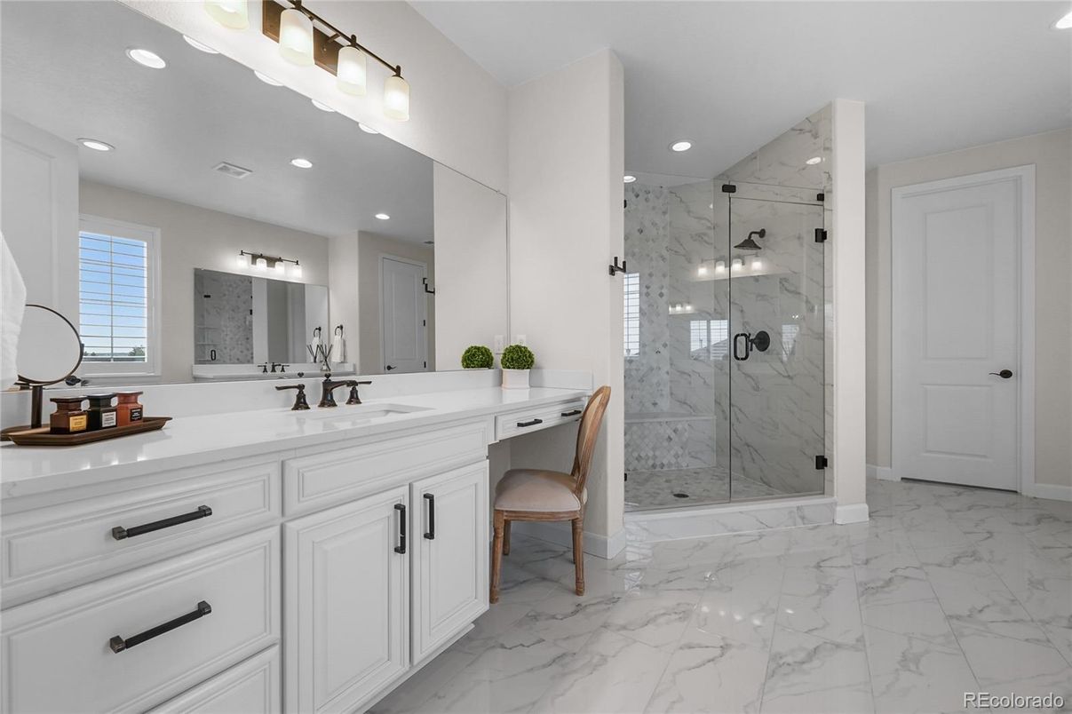 Bathroom, Dual Sink Vanities, Glass Shower, Interior, Marble, Marble Walls, Recessed Lighting