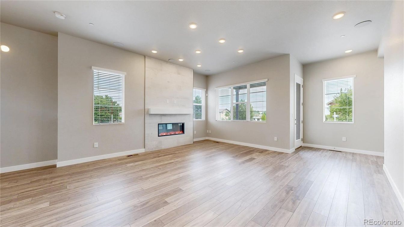 Empty room, Fireplace, Interior, Recessed Lighting, Wood Texture Flooring
