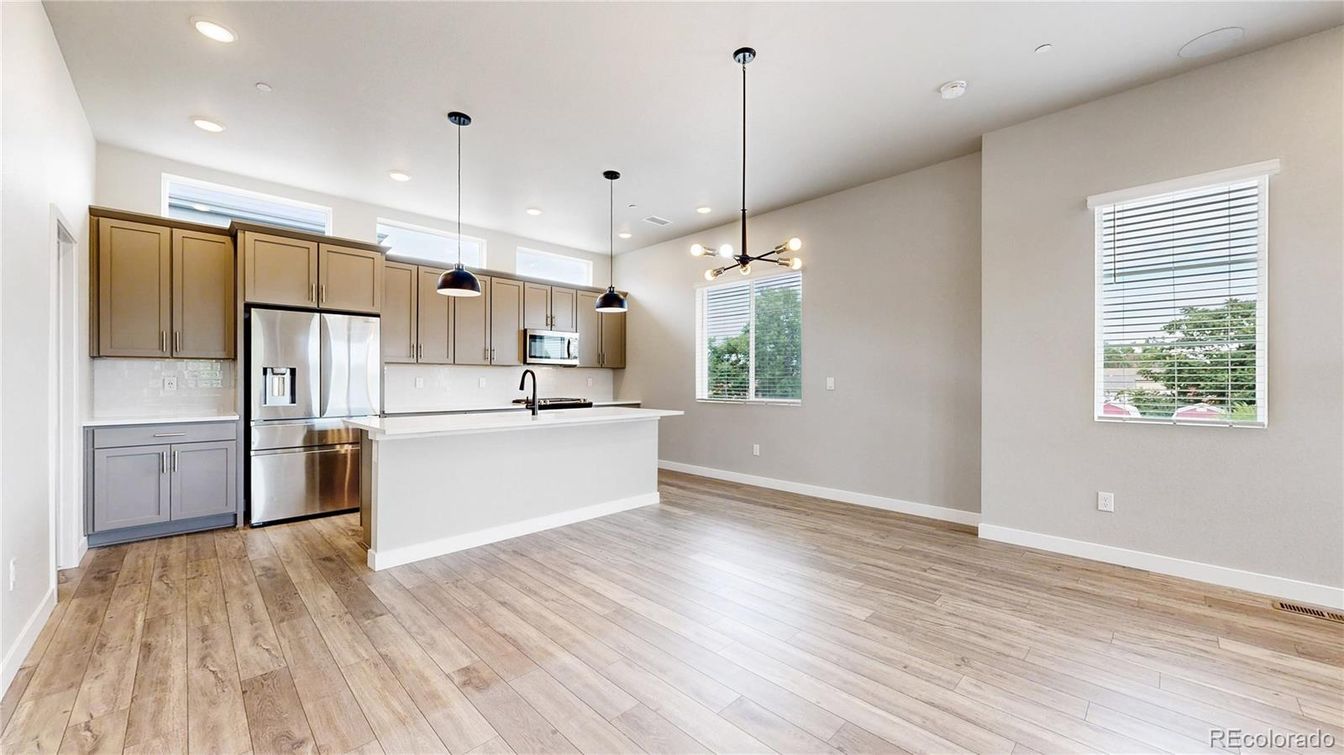 Interior, Kitchen, Pendant Lights, Recessed Lighting, Stainless Steel Appliances, Wood Texture Flooring